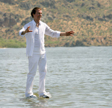 Walking on water - Photo of Andre Kole during a trick illusion of him walking on water, in a way similar to Jesus walking on water.