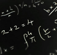 Did God design the laws of the universe - Photo of mathematical equations on a blackboard to illustrate the mathematical consistency of natural laws.