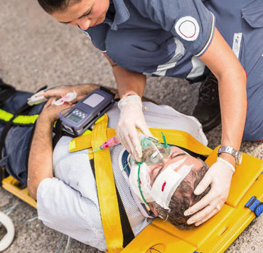 God's help in crisis - Photo of a person being treated by an EMT to raise the question of what God can do to help in times of crisis.