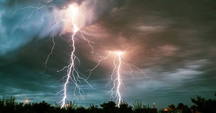 Why is life so hard - Photo of two dramatic sky to ground lightning strikes, to illustrate the difficulties that strike us in life.